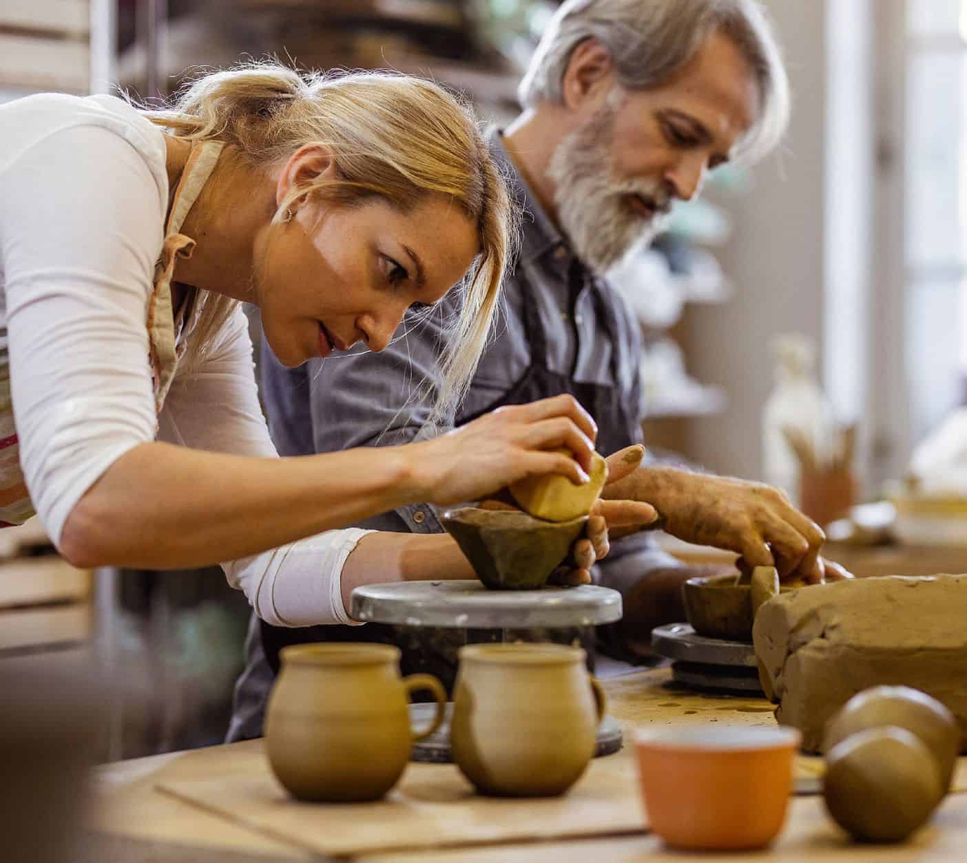 People doing pottery.